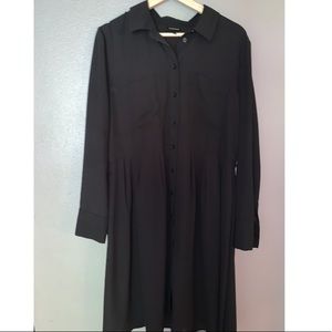 Modest little black dress. Button down alone